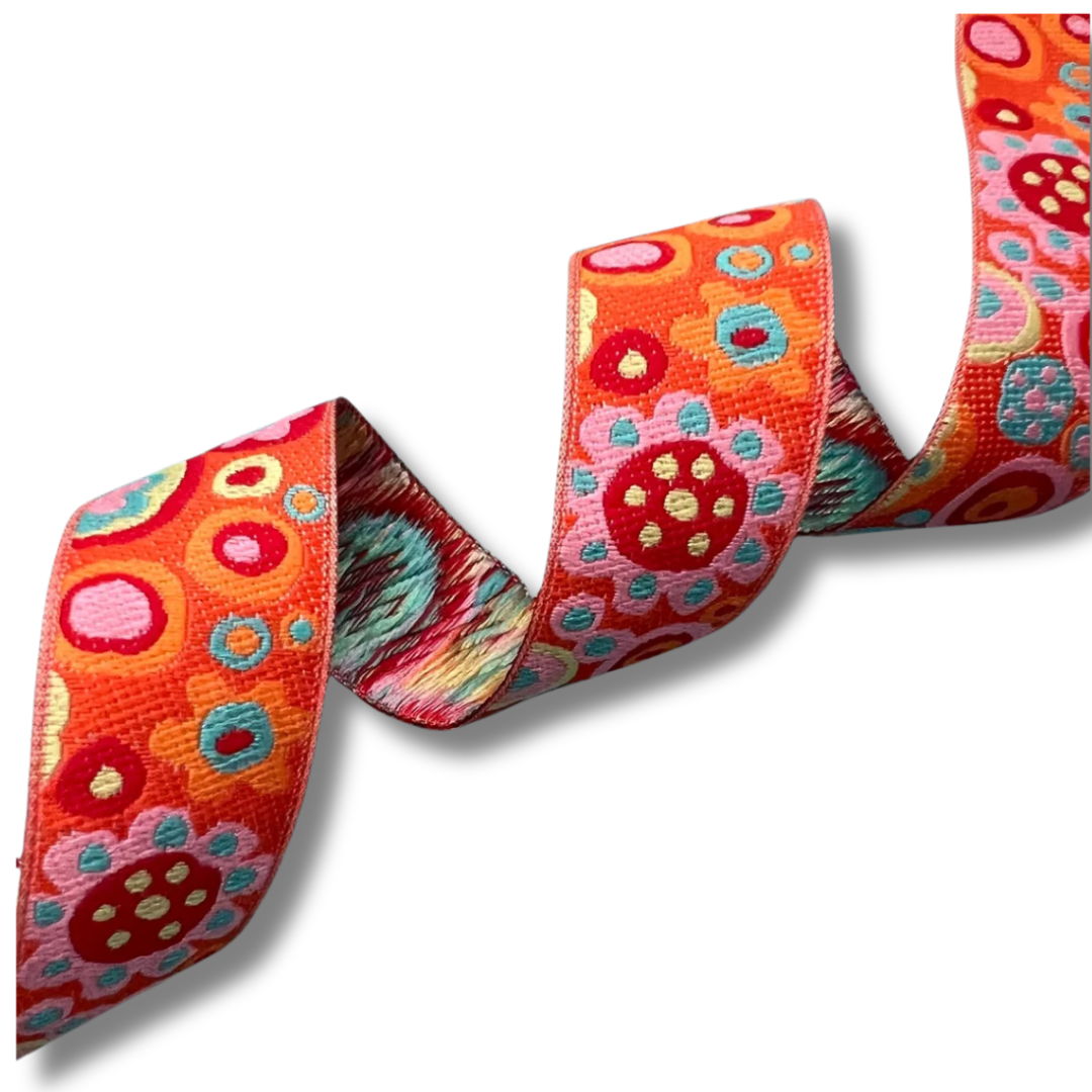 Colorful floral patterned ribbon on a white background