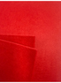 Red felt fabric with a textured surface