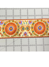 Decorative border with floral and circular patterns on a gray background with measurement scale.