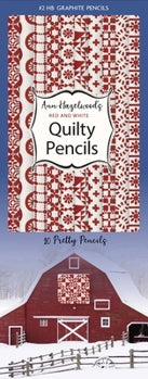 Packaging of Quilty Pencils with a barn and quilt design on a blue background