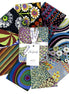 Collection of colorful fabric cuts arranged in a circular pattern 