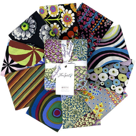 Collection of colorful fabric cuts arranged in a circular pattern 