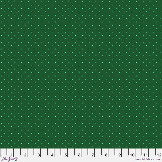 dark Green fabric with light blue polka dots and a ruler at the bottom