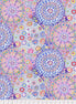 Colorful floral and geometric pattern fabric with a ruler at the bottom