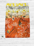 Stack of floral fabric swatches in various colors on a wooden surface