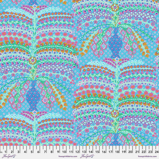 Colorful paisley pattern fabric with a ruler at the bottom