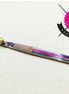 Multicolored craft knife with 'Tula Pink' branding on a white background