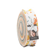Fabric roll with circular pattern and visible brand label on a white background