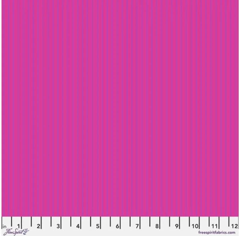 bright Pink fabric with thin purple stripes and a ruler at the bottom