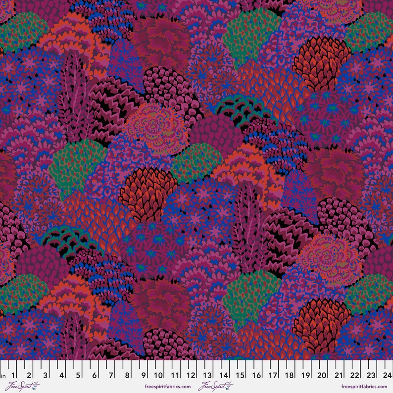 Colorful patterned fabric with a ruler at the bottom for scale