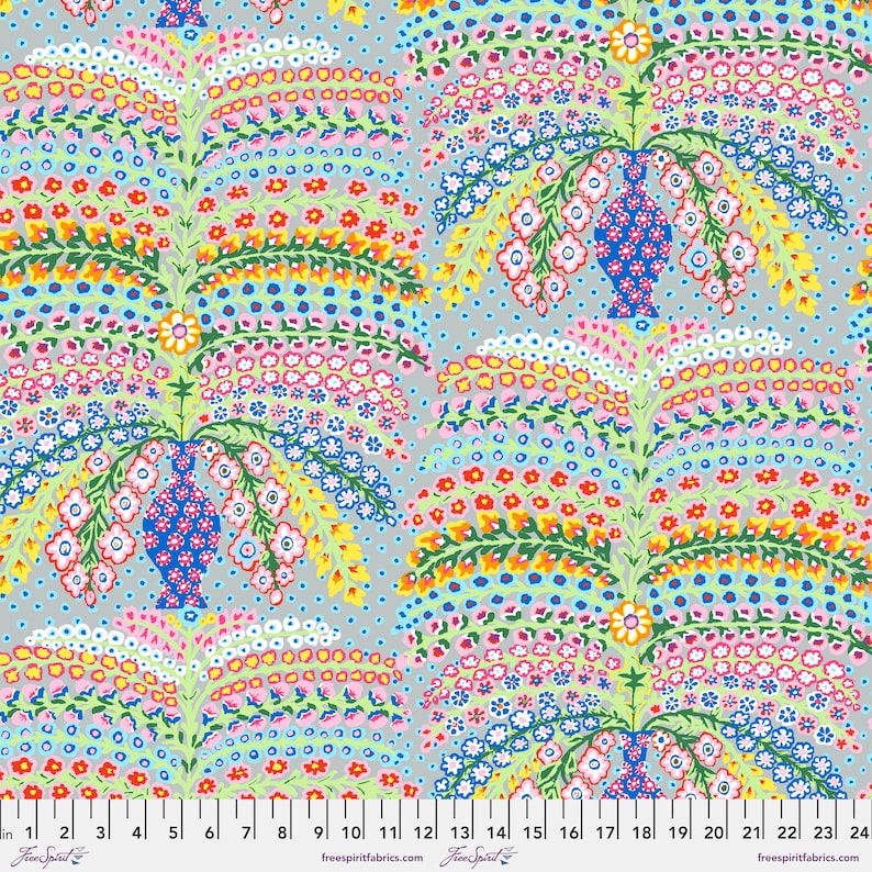 Colorful floral and leaf pattern with a ruler at the bottom for scale.