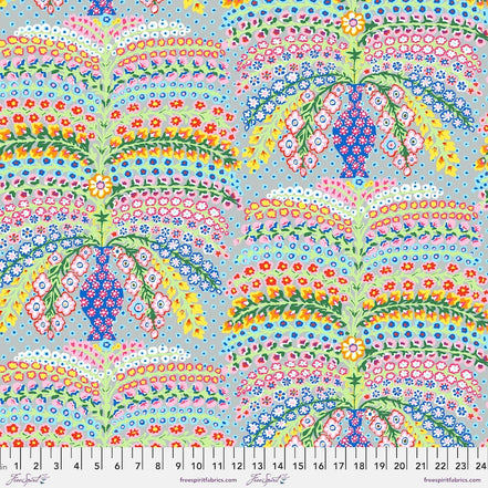 Colorful floral and leaf pattern with a ruler at the bottom for scale.