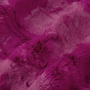 Close-up of a textured purple fabric surface