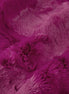 Close-up of a textured purple fabric surface