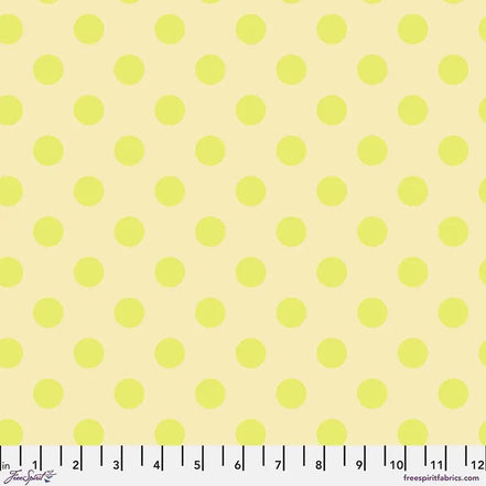 Fabric with small yellow polka dots on a light yellow background