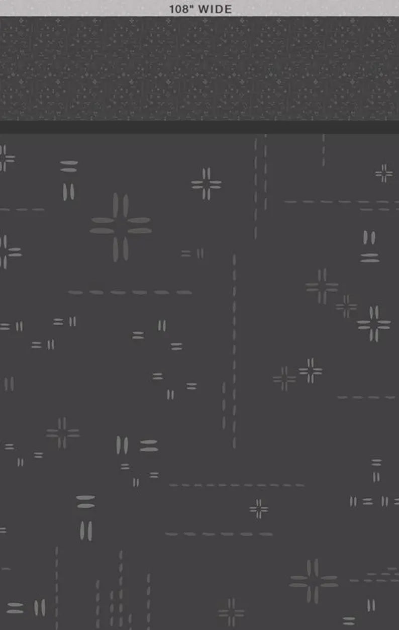 Pattern of geometric shapes on a dark gray background
