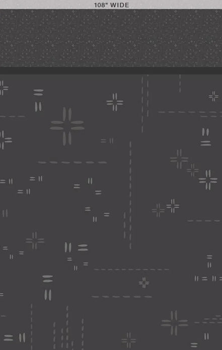Pattern of geometric shapes on a dark gray background