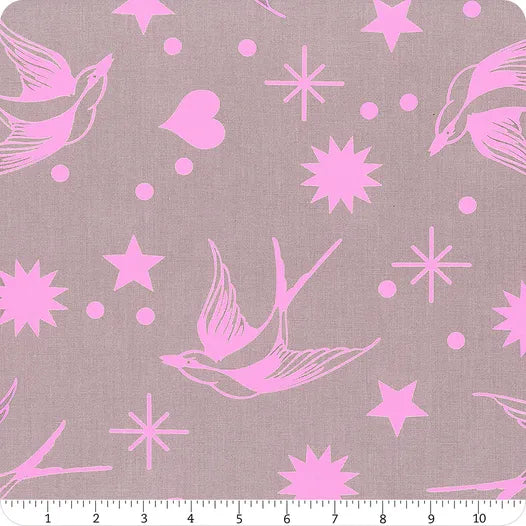 Pink birds and stars pattern on a gray background with a ruler at the bottom.