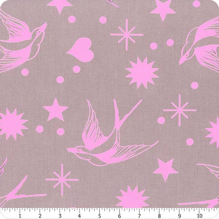 Pink birds and stars pattern on a gray background with a ruler at the bottom.