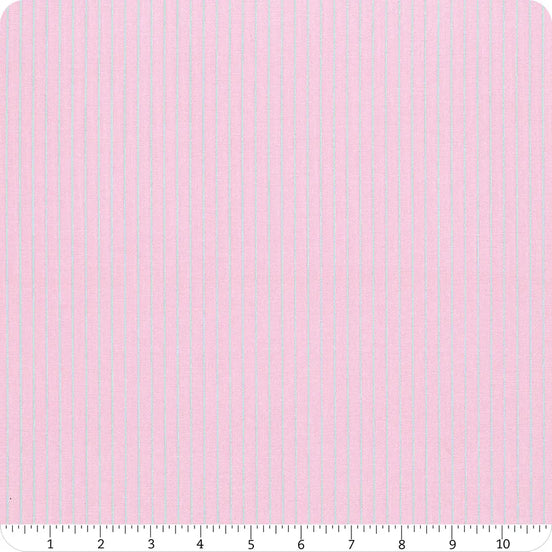 Pink fabric with small white stripes on a pink background