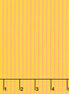 Yellow fabric with pink vertical stripes and a ruler at the bottom.